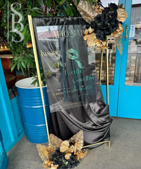 Customized Signage & Flower Arrangements
